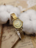 1990s Vintage Fossil PR5002 Gold-Tone Roman Numeral Dress Watch – Textured Bezel Edition