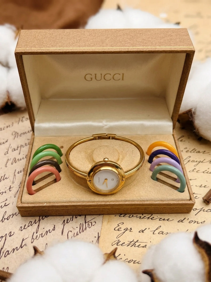 1980s–1990s Vintage Gucci 1100-L Change Bezel Bangle Watch Set – Gold-Tone & Interchangeable Bezel Rings Edition