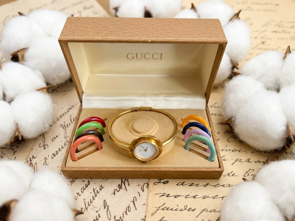 1980s–1990s Vintage Gucci 1100-L Change Bezel Bangle Watch Set – Gold-Tone & Interchangeable Bezel Rings Edition