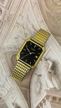 Vintage Bulova Gold-Tone Octagonal Dress Watch – Black Date Dial & Expansion Band Edition