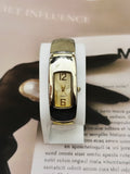 Vintage Two-Tone Curved Tank Dress Watch – Champagne Dial & Solid Bangle Bracelet Edition