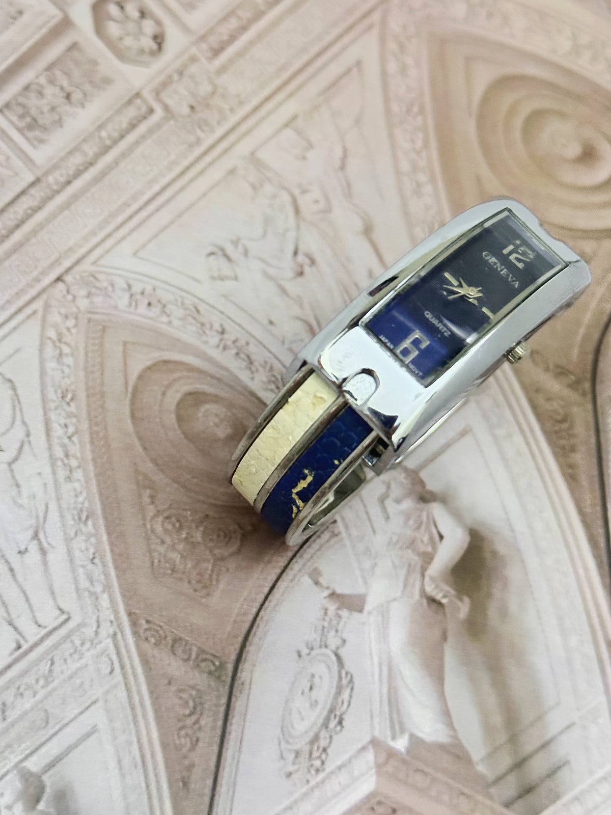 Vintage Geneva Curved Silver-Tone Bangle Watch – Sunburst Blue Dial & Blue Inset Edition