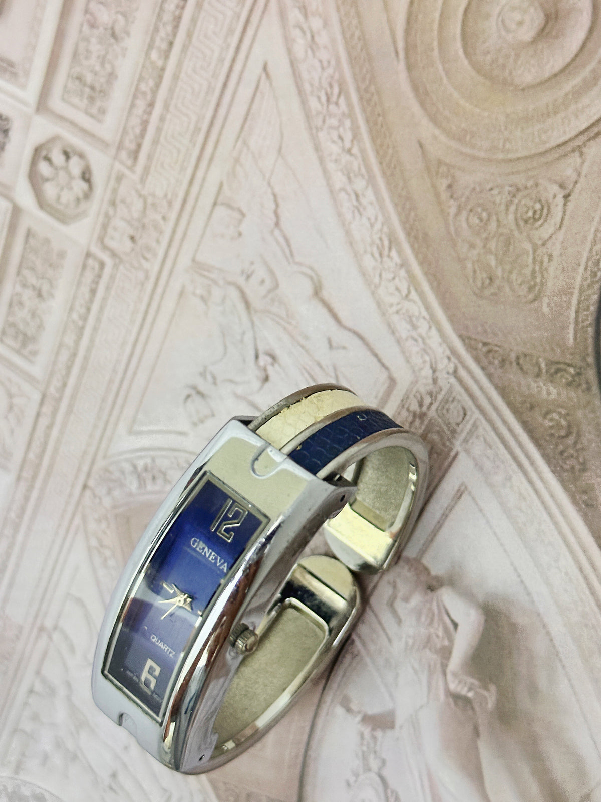 Vintage Geneva Curved Silver-Tone Bangle Watch – Sunburst Blue Dial & Blue Inset Edition
