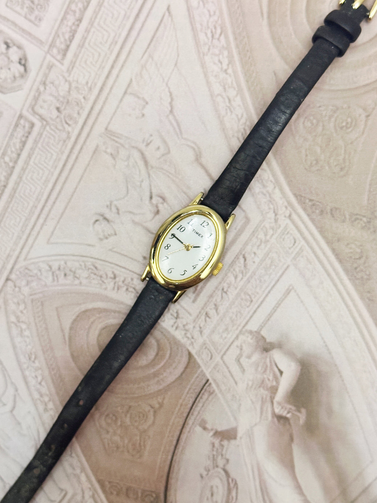 Vintage Timex Gold-Tone Oval Ladies Watch – White Dial & Black Leather Strap Edition
