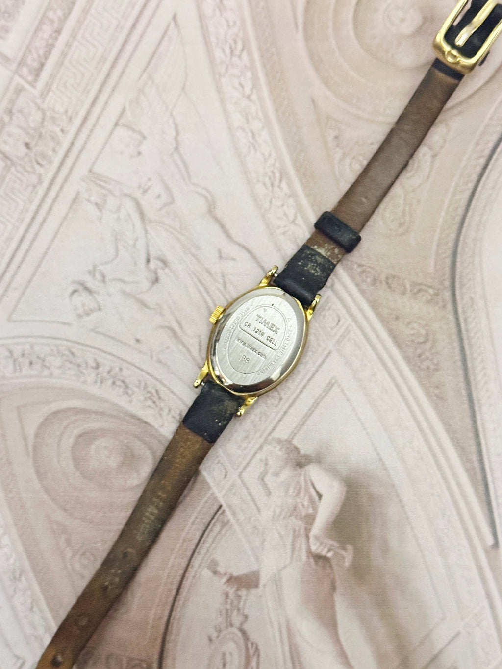 Vintage Timex Gold-Tone Oval Ladies Watch – White Dial & Black Leather Strap Edition