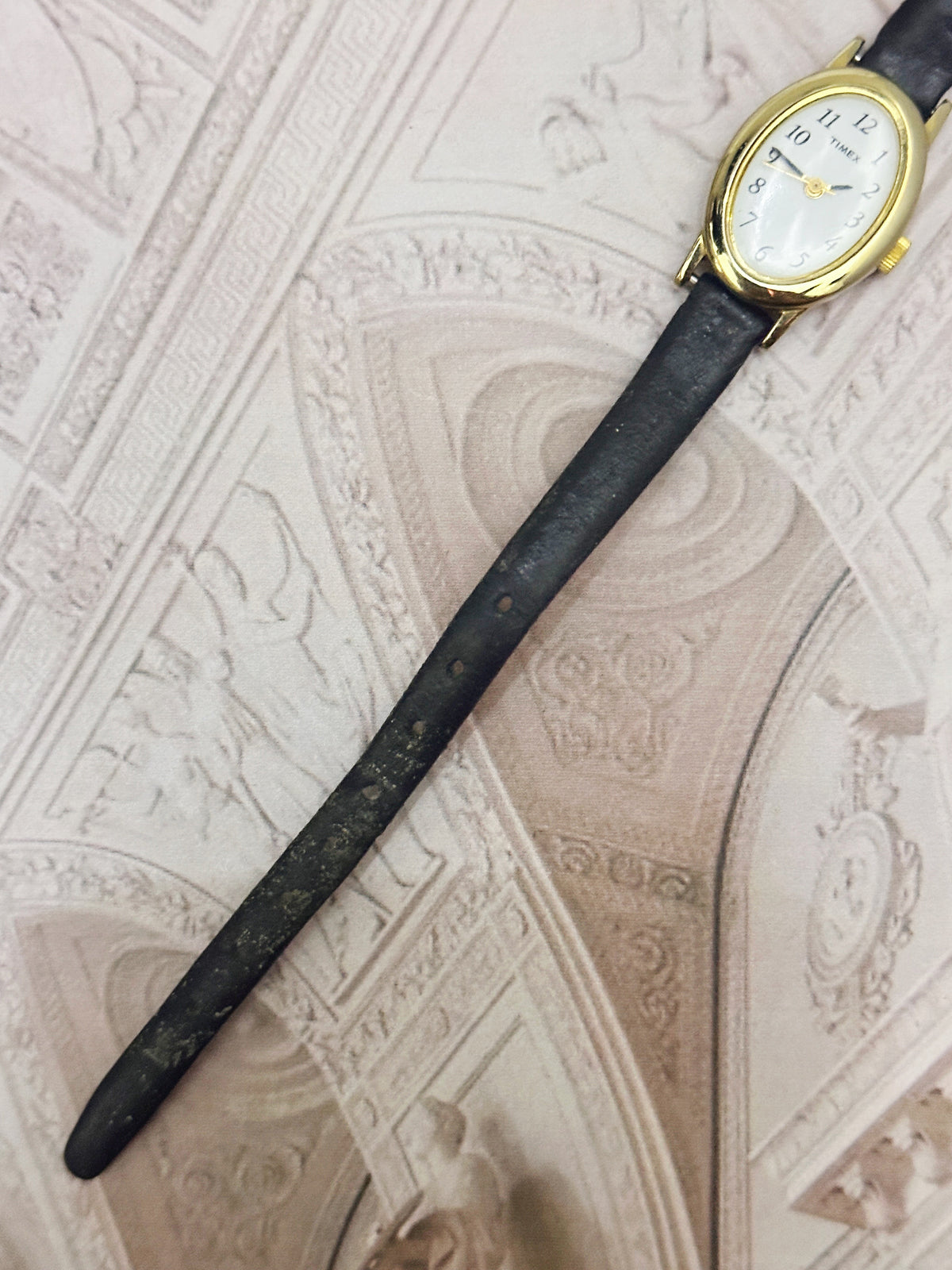 Vintage Timex Gold-Tone Oval Ladies Watch – White Dial & Black Leather Strap Edition