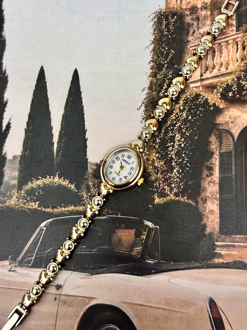 1990s Vintage "Watch-It" Gold-Tone Oval Ladies Dress Watch – White Dial & Heart-Bead Bracelet Edition