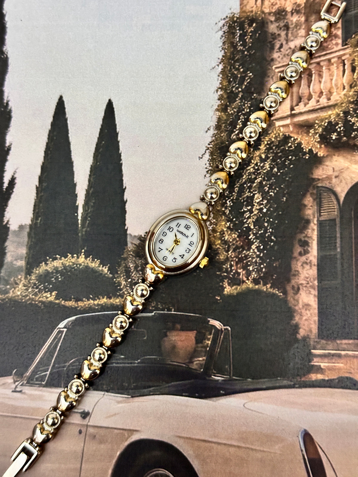 1990s Vintage "Watch-It" Gold-Tone Oval Ladies Dress Watch – White Dial & Heart-Bead Bracelet Edition