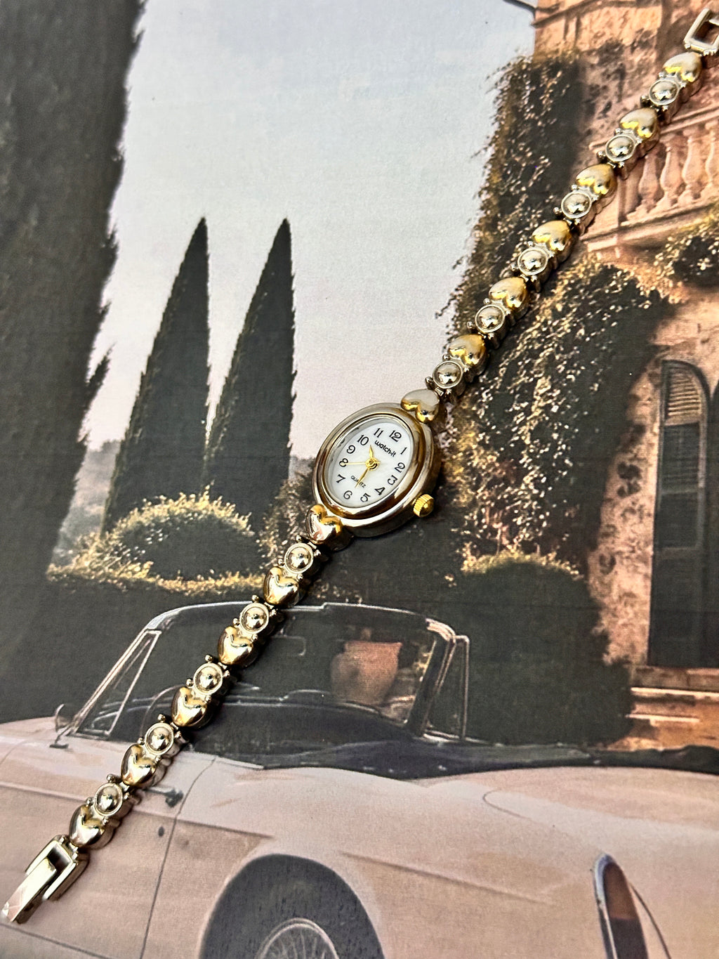 1990s Vintage "Watch-It" Gold-Tone Oval Ladies Dress Watch – White Dial & Heart-Bead Bracelet Edition