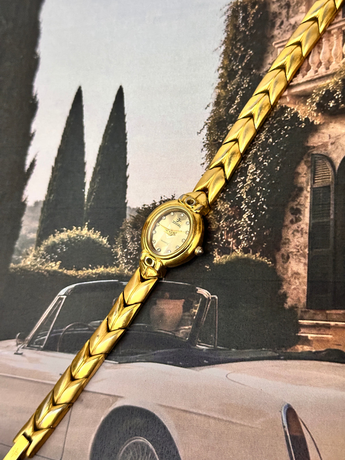 Vintage Jovial Gold-Tone Ladies Cocktail Watch – Dark Sunburst Dial & Chevron Link Bracelet Edition