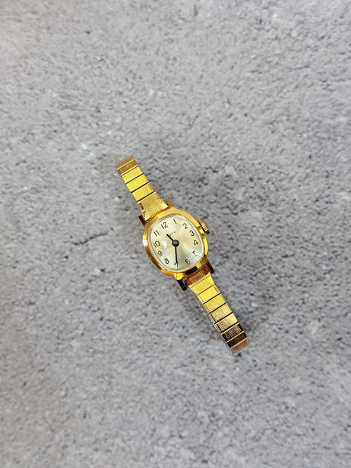 1970s Vintage Timex Gold-Tone Mechanical Dress Watch – Cushion Case Expansion Band Edition